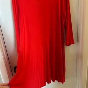 Chico’s asymmetrical tunic in runaway red